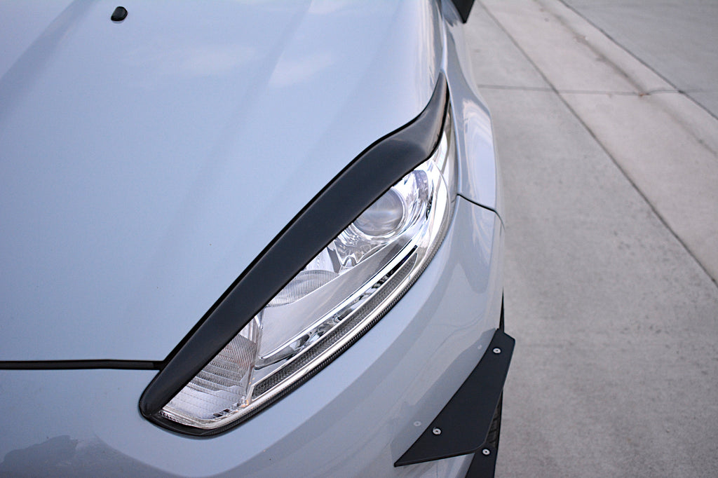 Maxton Design Scheinwerfer Blenden Böser Blick passend für V.1 Ford Fiesta ST / ST-Line / Standard Mk7 FL schwarz Hochglanz